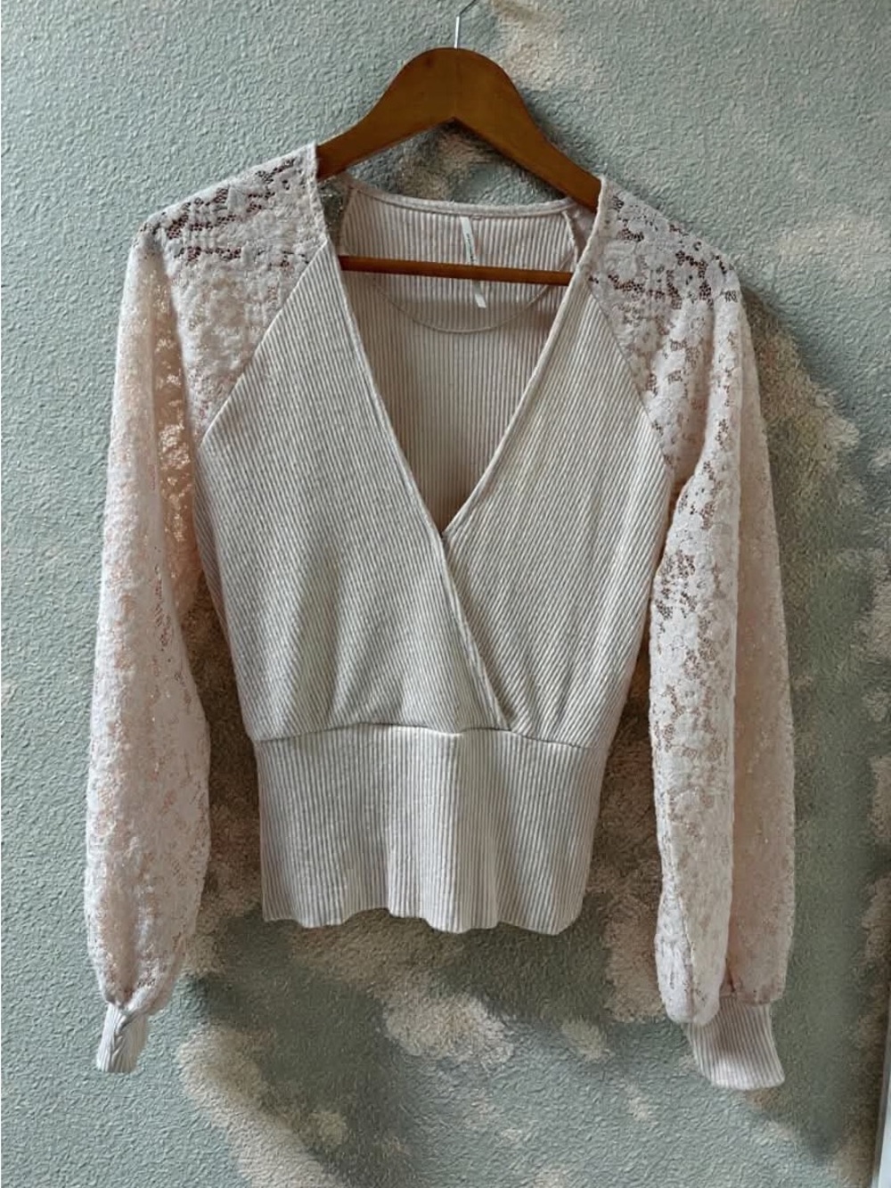 Anthropologie Ribbed Surplice Top with Lace Sleeves in cream- colored